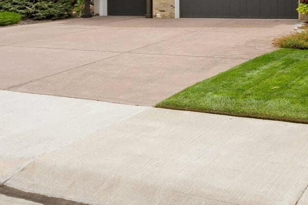 Colour-through concrete that stays tidy on busy Adelaide driveways and paths - Coloured Concrete Adelaide